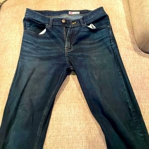 Blue Wrangler slim straight jeans.